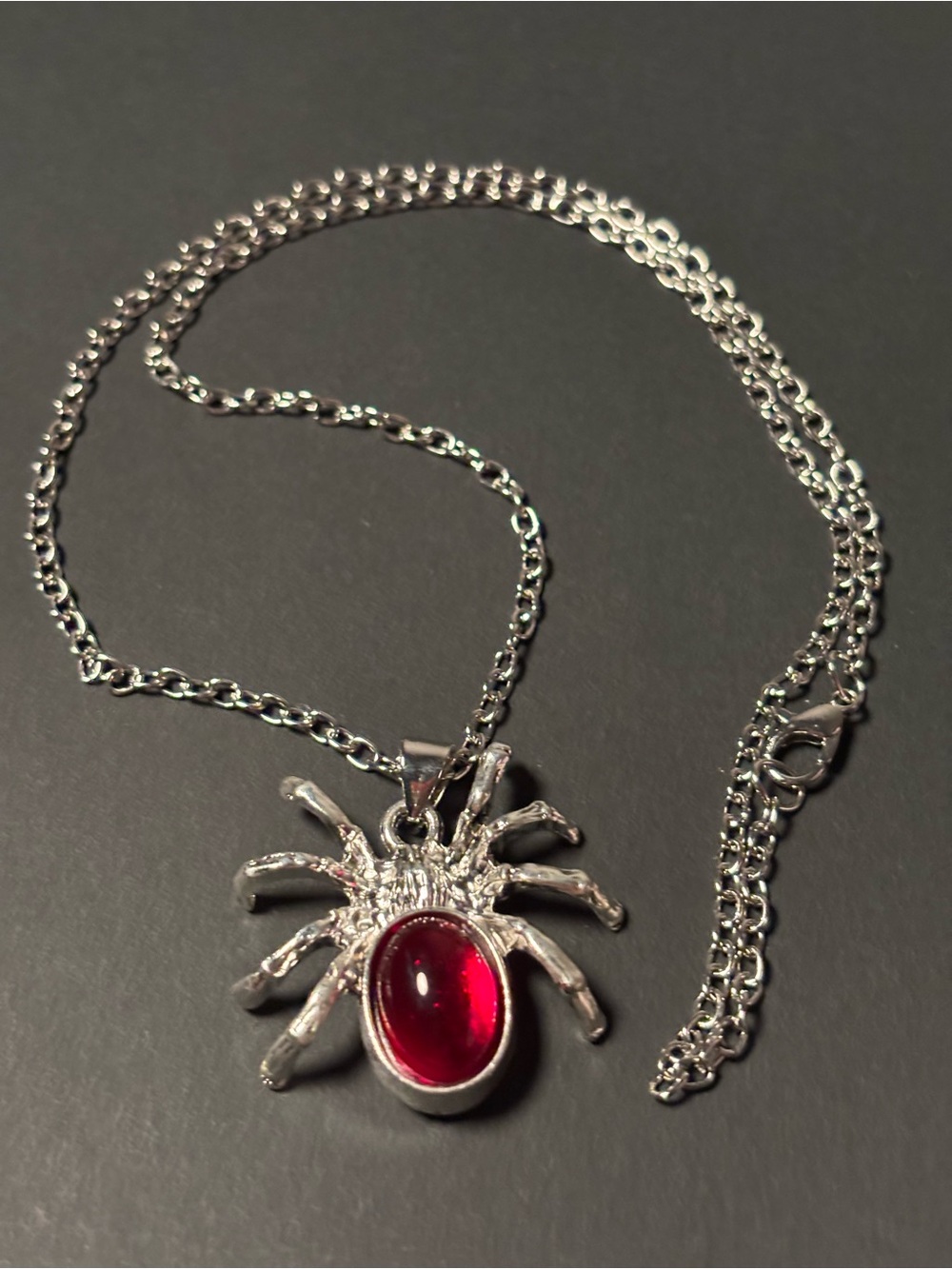 Silver Spider Pendant Necklace with Red Gemstone Accent